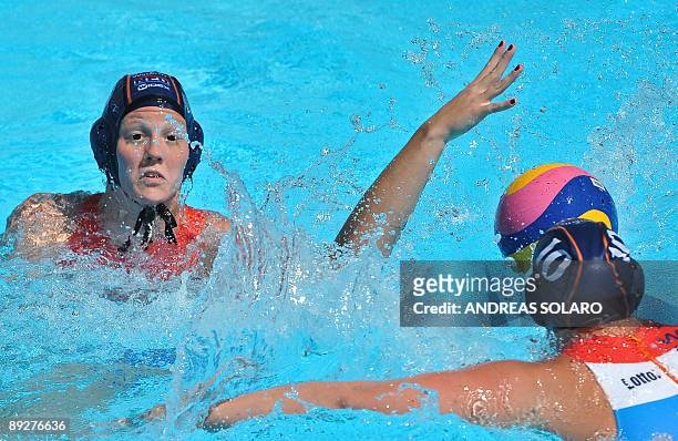 Russian Evgenia Ivanova fights for the ball against Netherlands players during the water-polo Quarterfinal Women, Russia Vs Netherlands on July 27,...