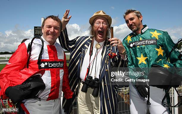 Phil Tufnell and Jason Gillespie are joined by John McCririck as they prepare to race during the Betfair Stakes horse race, part of the Betfair...