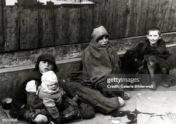 Children in the street in the Warsaw Ghetto, Poland, 1941.