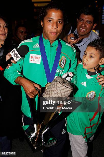 Mexican national soccer team player Giovani dos Santos upon arrival at the International Airport Benito Juarez on July 27, 2009 in Mexico City,...