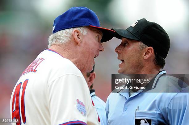 Manager Charlie Manuel of the Philadelphia Phillies argues with home plate umpire Dan Iassogna during the game against the Chicago Cubs at Citizens...