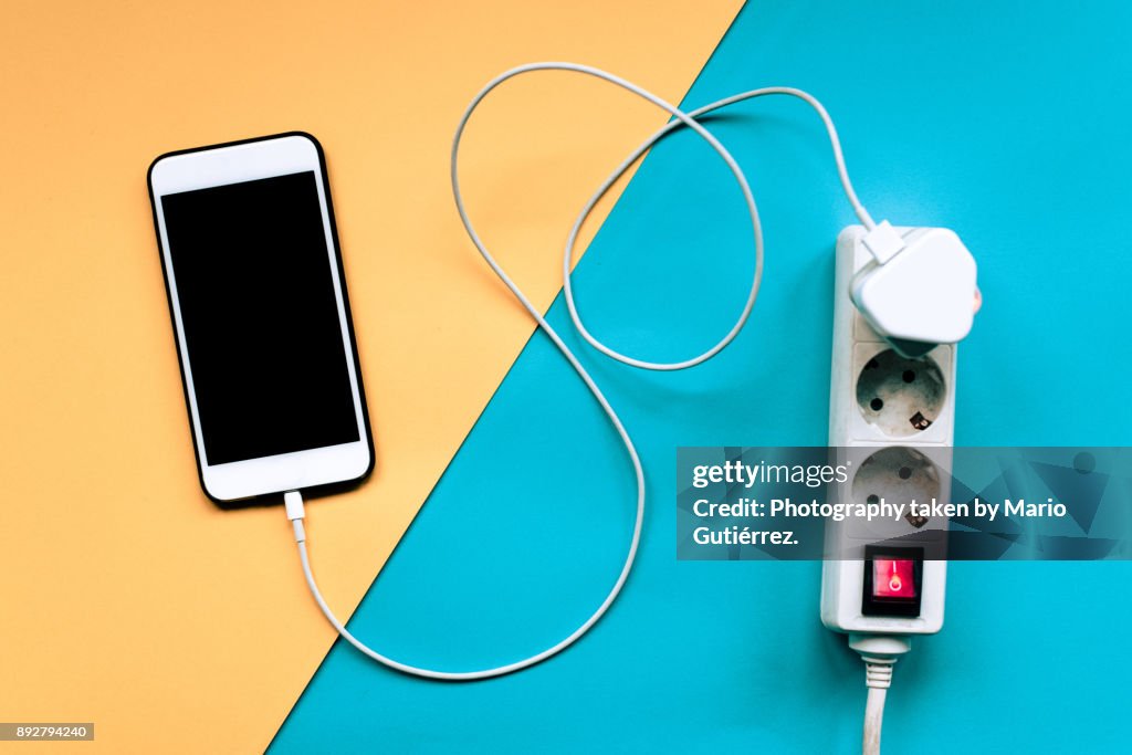 Smartphone being charged