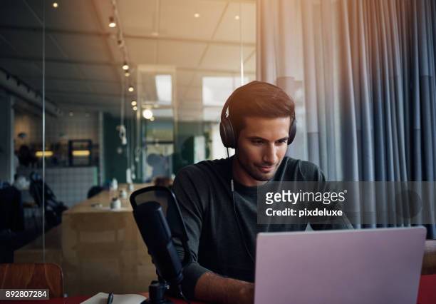 testing out podcast equipment - computer headset stock pictures, royalty-free photos & images