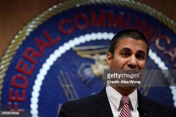 Federal Communications Commission Chairman Ajit Pai speaks to members of the media after a commission meeting December 14, 2017 in Washington, DC....