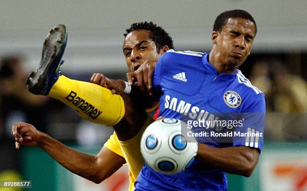 Scott Sinclair of Chelsea FC fights for possesion of the ball with Jean Beausejour of Club America during the World Football Challenge at Dallas...
