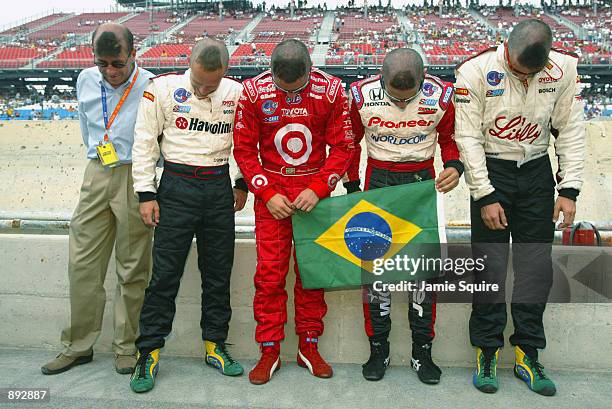 Brazilian drivers Roberto Moreno,Cristiano da Matta, Bruno Junqueira, Tony Kanaan and Christian Fittipaldi display their support for their soccer...