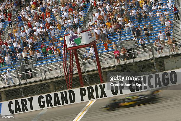 Cristiano da Matta powers across the start finish line during the Grand Prix of Chicago round 7 of the CART FedEx Championship Series on June 30th...