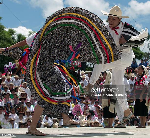Regional dancers perfom at the Guelaguetza celebration on July 27, 2009 in Oaxaca, Mexico. The Guelaguetza is a festival held once a year which...