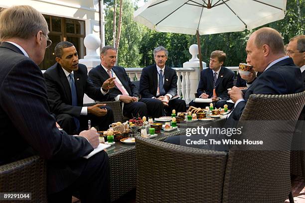 In this photo provided by The White House, U.S. President Barack Obama and members of the American delegation, National Security Advisor General Jim...