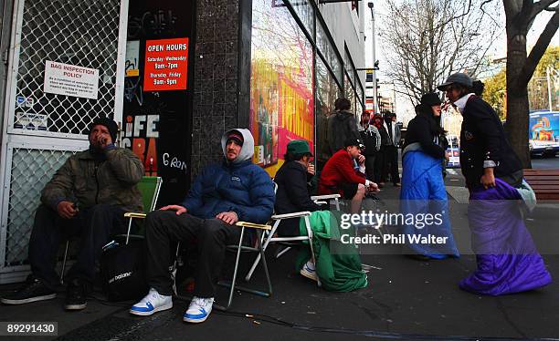 Fans wait in line after spending a night outside Real Groovy Records to buy tickets for AC/DC's 2010 Auckland Concert on July 28, 2009 in Auckland,...