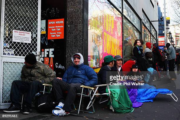 Fans wait in line after spending a night outside Real Groovy Records to buy tickets for AC/DC's 2010 Auckland Concert on July 28, 2009 in Auckland,...
