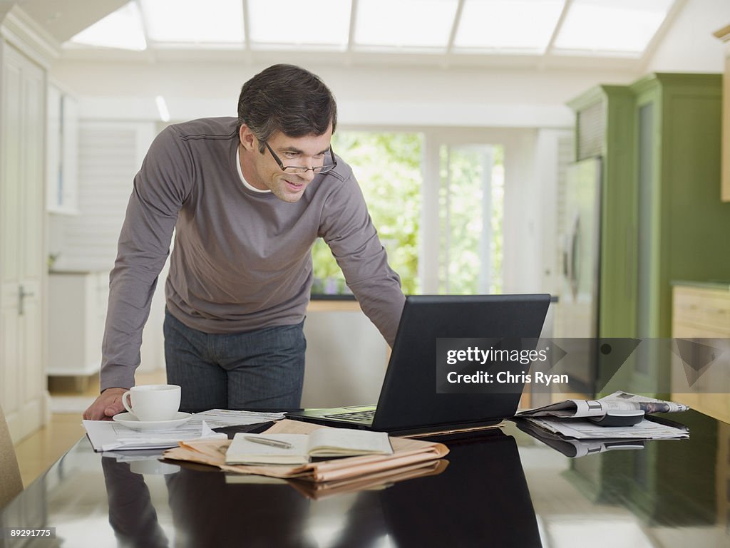 Man looking at laptop