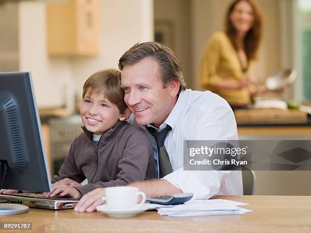 Home Computing Happy Happy Family Home Computer Photos and Premium High Res Pictures - Getty ...