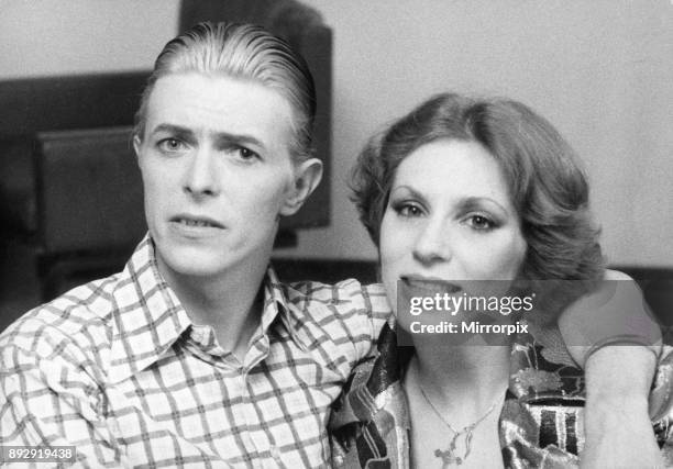 David Bowie seen here with his wife Angie during a visit to London in 4th May 1976.