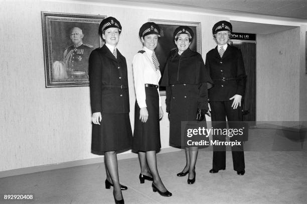 The new Police image. W.P.C Leslie Cosburn, left, from Bow shows off the stylish new uniform and reflecting the modern 1977 Police image, alongside...