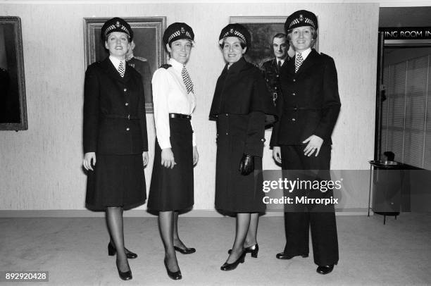 The new Police image. W.P.C Leslie Cosburn, left, from Bow shows off the stylish new uniform and reflecting the modern 1977 Police image, alongside...