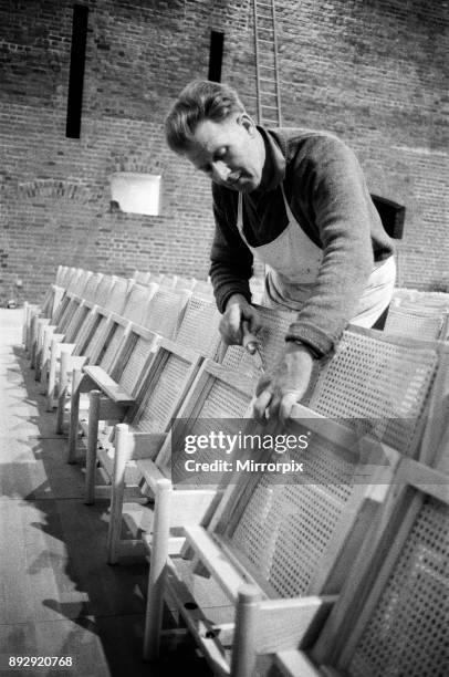 A week carpenter Len Edmunds playing his homemade violin, as he tests the acoustics of Britain's newest 150,000 concert hall converted from an old...