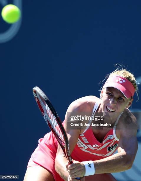 Elena Dementieva of Russia returns a shot against Anne Keothavong of Great Britian during the Bank of the West Classic Day 1 at Stanford University...