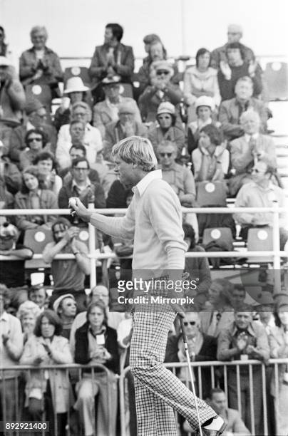 British Open 1975. Carnoustie Golf Links, Scotland, held 9th - 13th July 1975. Pictured, Johnny Miller acknowledges the crowd after his putt, 11th...