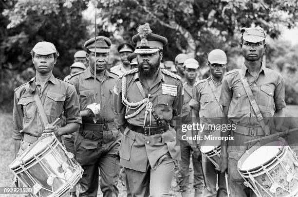 Colonel Odumegwu Ojukwu, the Military Governor of Biafra in Nigeria inspecting some of his troops, 11th June 1968. The Nigerian Civil War, also known...
