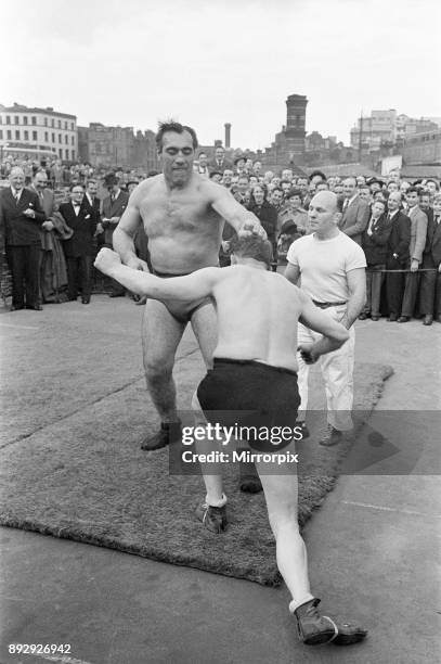 Primo Carnera v Al Hayes, Open Air Training Session at Ludgate Circus Gardens, London, a bomb site, draws lunch time crowds, London, 8th May 1952. He...