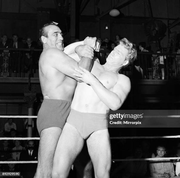 Primo Carnera, actor and professional wrestler, also a former professional boxer, pictured filming scenes for new film, A Kid for Two Farthings, at...