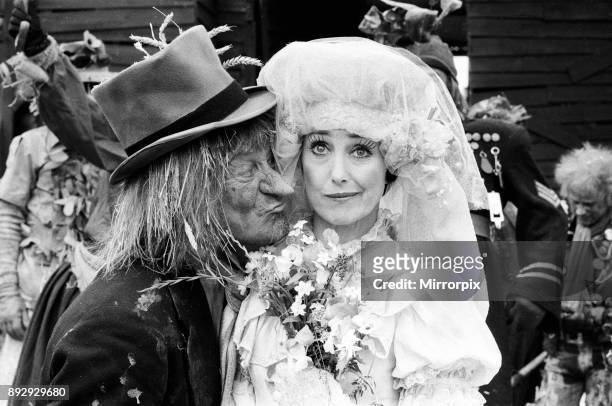 Television character Worzel Gummidge who is played by Jon Pertwee marries his Aunt Sally, played by Una Stubbs, in a barn at Braishfield, near...