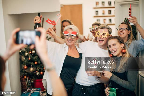 group photo at work - naughty christmas ornaments stock pictures, royalty-free photos & images