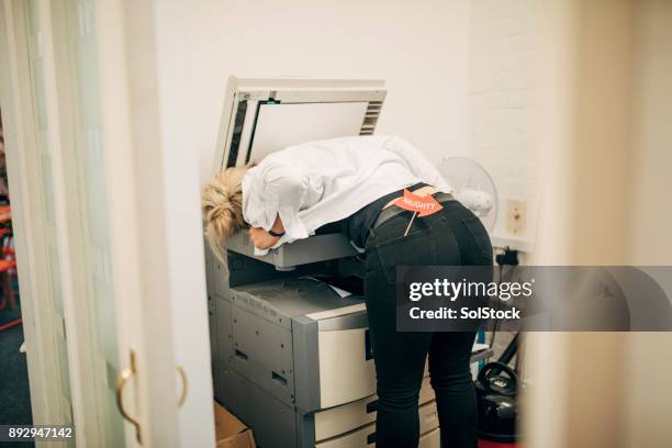 employee photocopying her chest - funny christmas stock pictures, royalty-free photos & images