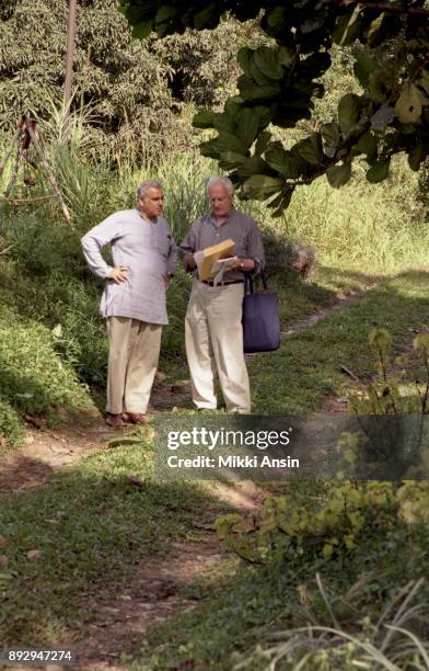 Director Ismail Merchant discussing filming with Director James Ivory while filming 'The Mystic Masseur' in Trinidad in October 2001.