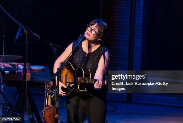 American Bluegrass, Country and Folk musician Sara Watkins plays guitar as she leads her band during a performance in the American Byways series at...