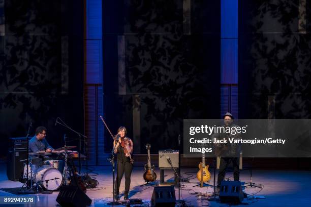 American Bluegrass, Country and Folk musician Sara Watkins plays guitar as she leads her band during a performance in the American Byways series at...