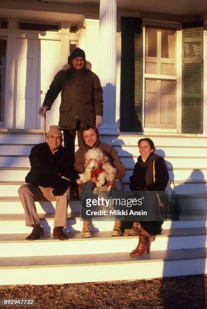 Director James Ivory, Producer Ismail Merchant, composer Richard Robbins, and writer Anna Kythreotis sit on the steps of the big house in Claverack,...