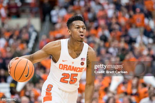 Tyus Battle of the Syracuse Orange handles the ball during the first half against the Colgate Raiders at the Carrier Dome on December 9, 2017 in...