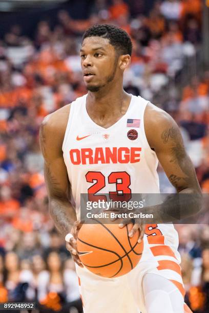 Frank Howard of the Syracuse Orange handles the ball during the second half against the Colgate Raiders at the Carrier Dome on December 9, 2017 in...