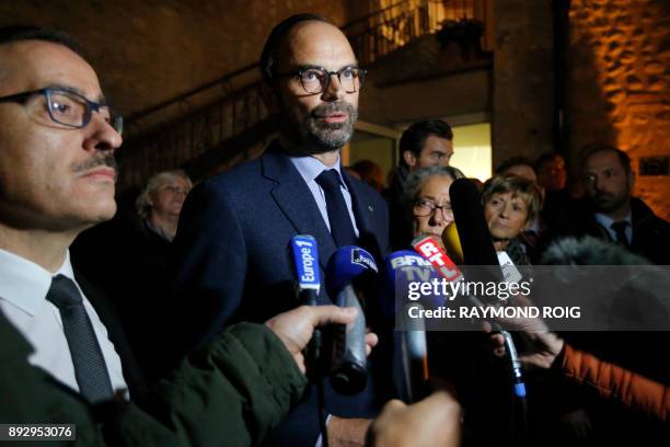 French Prime minister Edouard Philippe makes a statement during his visit at the site of an accident in Millas, near Perpignan, southern France, on...