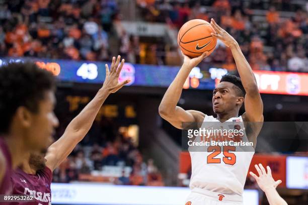 Tyus Battle of the Syracuse Orange shoots the ball during the second half against the Colgate Raiders at the Carrier Dome on December 9, 2017 in...