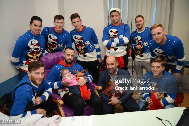 Month old Ruby Waugh of Chester-le-Street presented with Christmas gifts by the Sunderland squad and chief executive Martin Bain at Durham University...