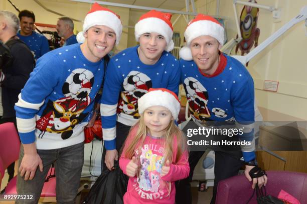 Sunderland players meet Leon Hyland during a Christmas visit to Sunderland Royal Infirmary on December 14, 2017 in Sunderland, England.