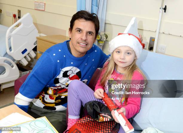 Sunderland manager Chris Coleman meets 7 year old Abi Smith during a Christmas visit to Sunderland Royal Infirmary on December 14, 2017 in...