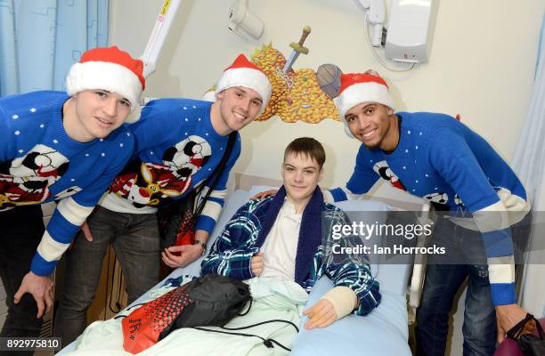 Sunderland players Donald Love George Honeyman and Brendan Galloway meet 15 year old Michael lumsden during a Christmas visit to Sunderland Royal...