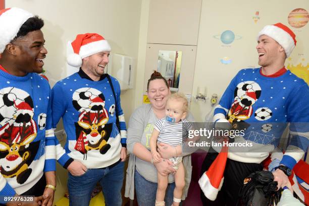 Sunderland players Josh Maja Lee Cattermole and Robin Ruiter meet 19 moth old Ollie Quinn during a Christmas visit to Sunderland Royal Infirmary on...