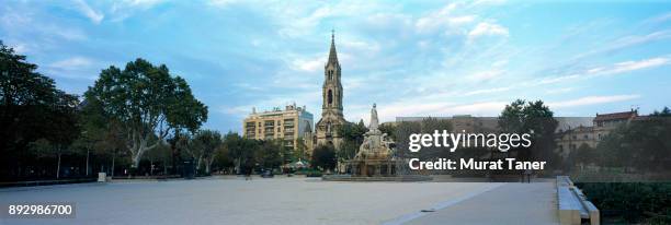 esplanade charles de gaulle and toer of eglise sainte perpetue church - nimes stock pictures, royalty-free photos & images