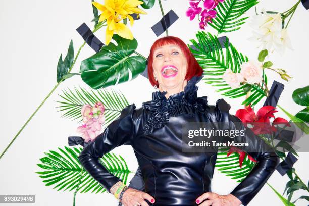 older woman laughing in couture clothing - fashionable stock pictures, royalty-free photos & images