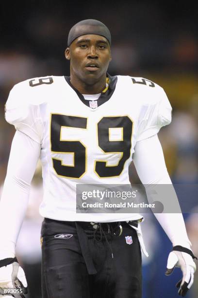 Keith Mitchell of the New Orleans Saints looks on against the New York Jets during the game on November 4, 2001 at the Superdome in New Orleans,...