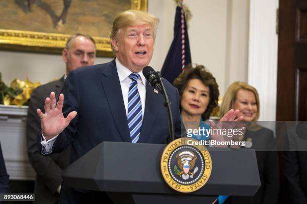 President Donald Trump speaks during an event in the Roosevelt Room of the White House, Thursday, Dec. 14, 2017. Trump trumpeted his effort to slash...