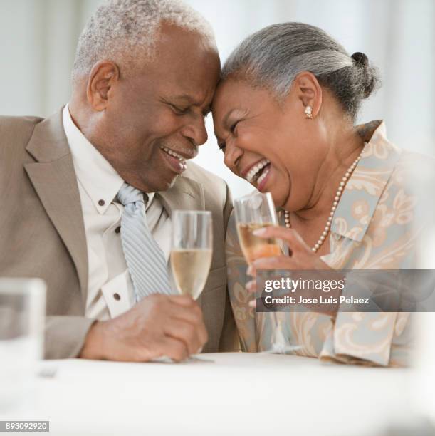 senior couple smiling and laughing - 70s wedding black couple stock pictures, royalty-free photos & images