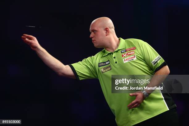 Michael van Gerwen of the Netherlands in action during his first round match against Christian Kist of the Netherlands during day one of the 2018...