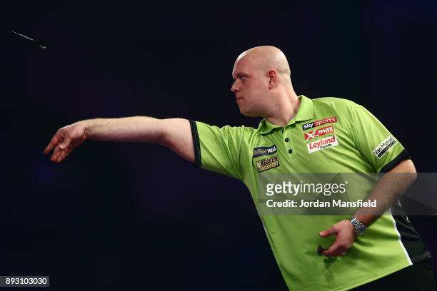 Michael van Gerwen of the Netherlands in action during his first round match against Christian Kist of the Netherlands during day one of the 2018...