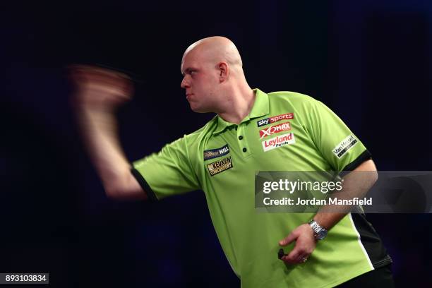 Michael van Gerwen of the Netherlands in action during his first round match against Christian Kist of the Netherlands during day one of the 2018...